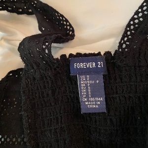 Empire waistline black eyelet top